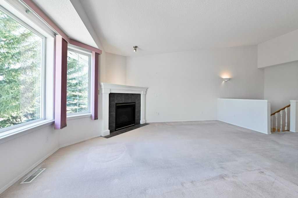 184 Valley Ridge Heights Nw, Calgary, AB - Indoor With Fireplace