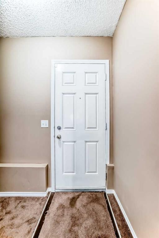 148 Saddlecrest Gardens Ne, Calgary, AB - Indoor Photo Showing Other Room