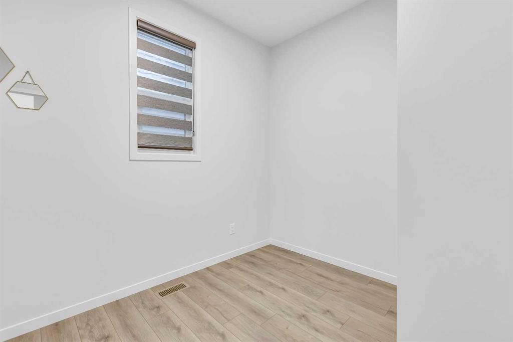 312 Edith Place Nw, Calgary, AB - Indoor Photo Showing Other Room