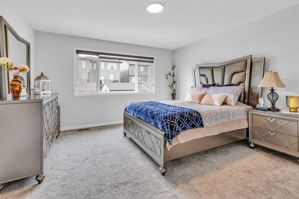 312 Edith Place Nw, Calgary, AB - Indoor Photo Showing Bedroom
