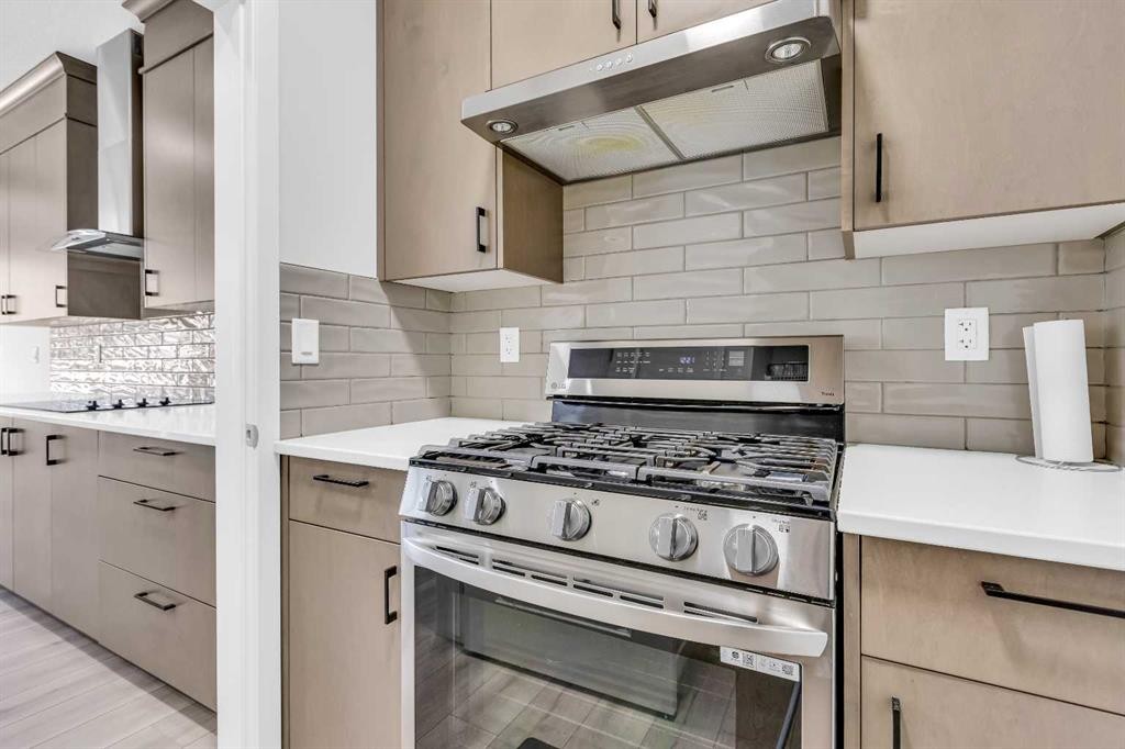 312 Edith Place Nw, Calgary, AB - Indoor Photo Showing Kitchen With Upgraded Kitchen
