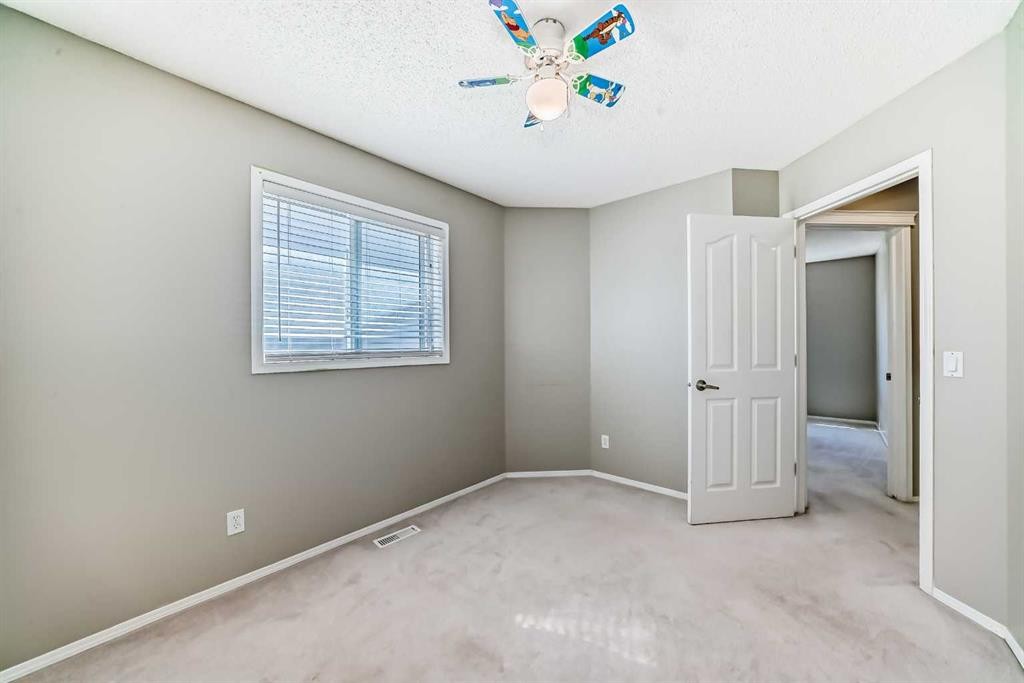 141 Somerglen Way Sw, Calgary, AB - Indoor Photo Showing Other Room