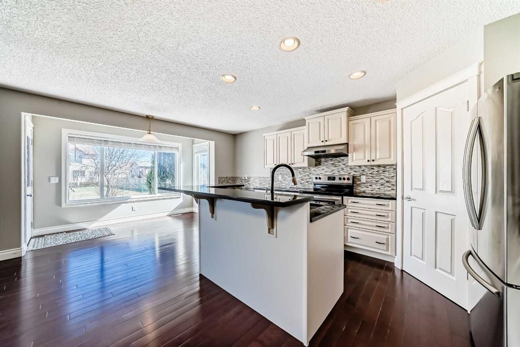 141 Somerglen Way Sw, Calgary, AB - Indoor Photo Showing Kitchen With Stainless Steel Kitchen With Upgraded Kitchen