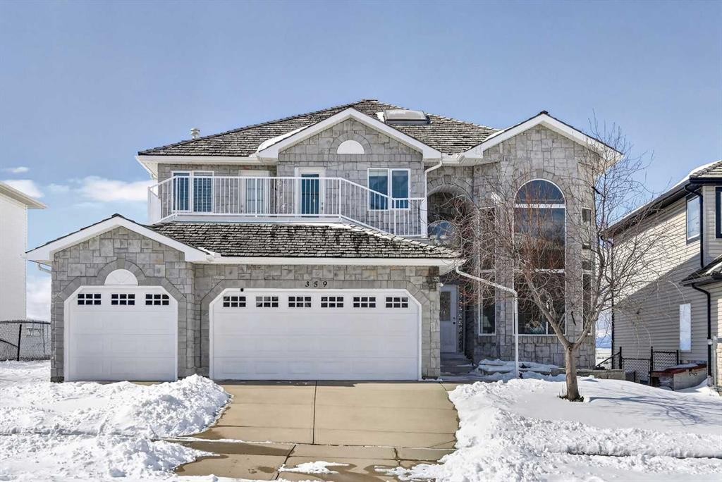 359 Rocky Ridge Drive Nw, Calgary, AB - Outdoor With Balcony With Facade