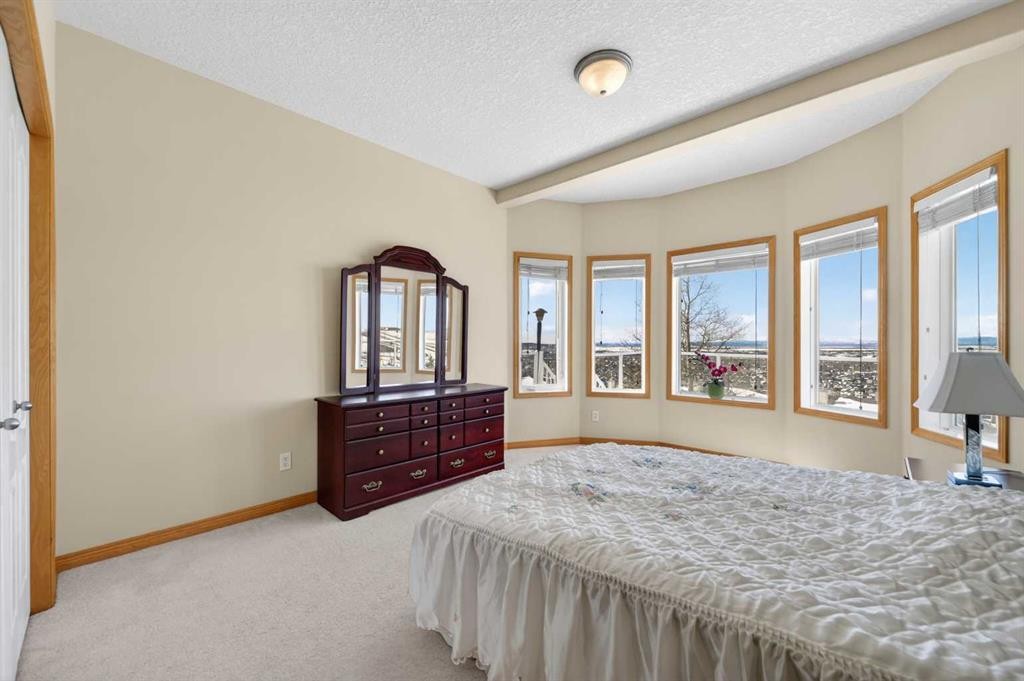 359 Rocky Ridge Drive Nw, Calgary, AB - Indoor Photo Showing Bedroom