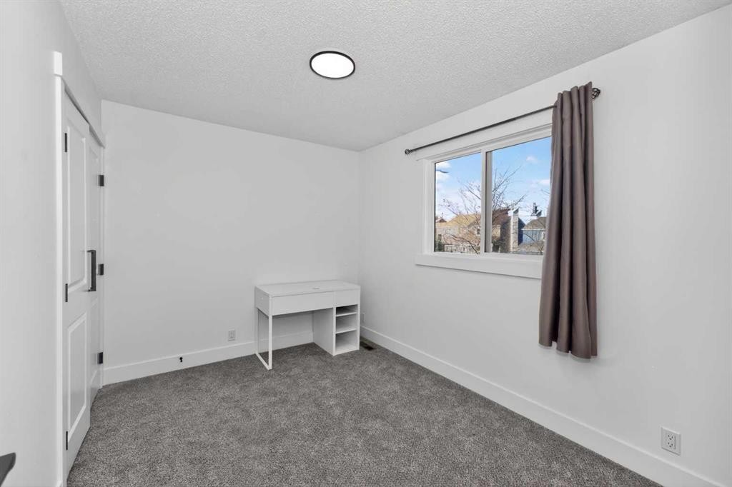 3319 56 Street Ne, Calgary, AB - Indoor Photo Showing Other Room