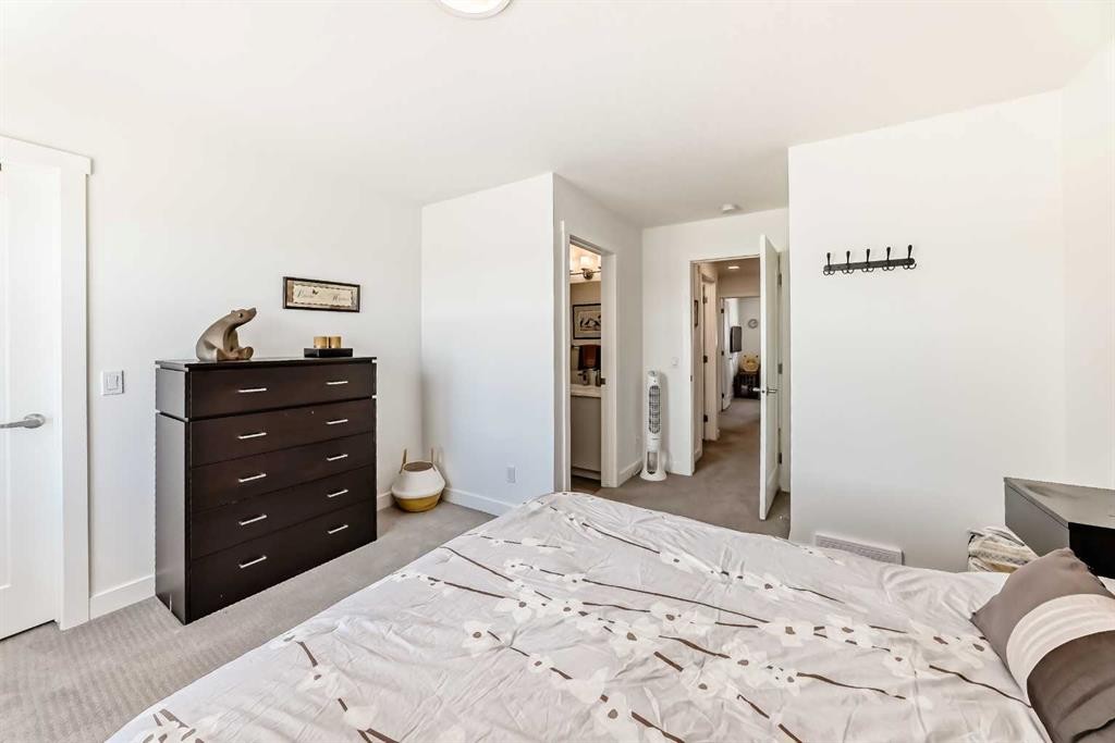 52 Walden Lane Se, Calgary, AB - Indoor Photo Showing Bedroom