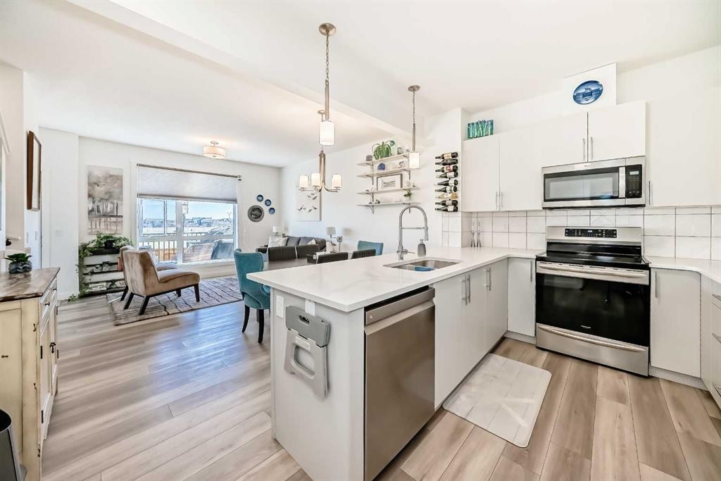 52 Walden Lane Se, Calgary, AB - Indoor Photo Showing Kitchen With Double Sink With Upgraded Kitchen