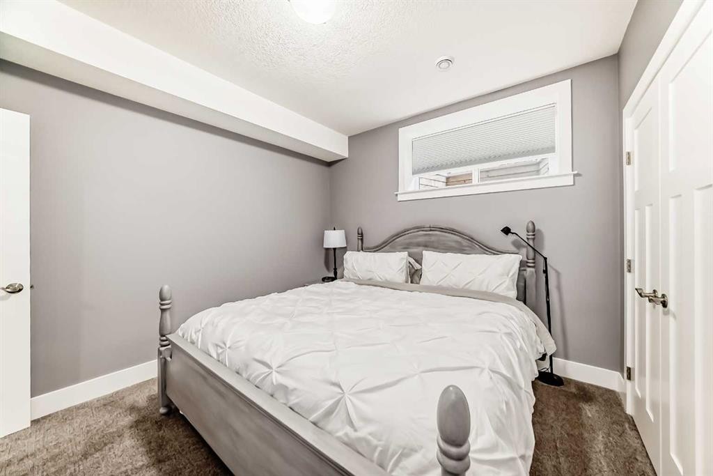 120 Kinniburgh Circle, Chestermere, AB - Indoor Photo Showing Bedroom