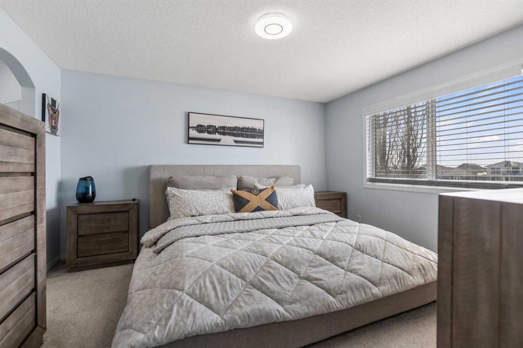 328 Rainbow Falls Way, Chestermere, AB - Indoor Photo Showing Bedroom