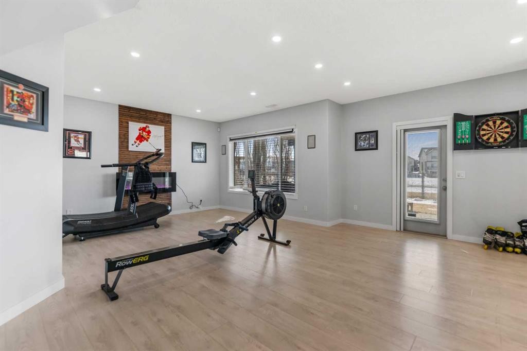 328 Rainbow Falls Way, Chestermere, AB - Indoor Photo Showing Gym Room