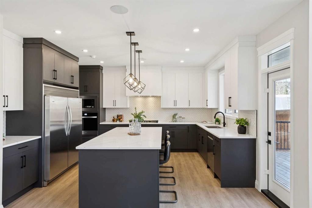 96 Cranbrook Way Se, Calgary, AB - Indoor Photo Showing Kitchen With Upgraded Kitchen