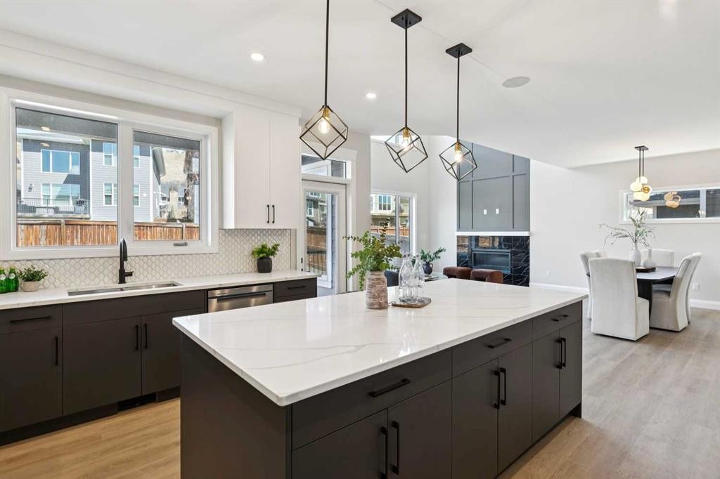 96 Cranbrook Way Se, Calgary, AB - Indoor Photo Showing Kitchen With Double Sink With Upgraded Kitchen