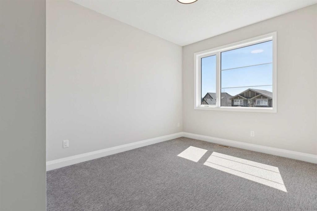 96 Cranbrook Way Se, Calgary, AB - Indoor Photo Showing Other Room