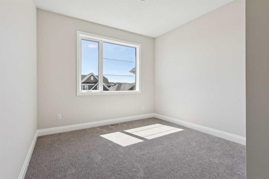 96 Cranbrook Way Se, Calgary, AB - Indoor Photo Showing Other Room
