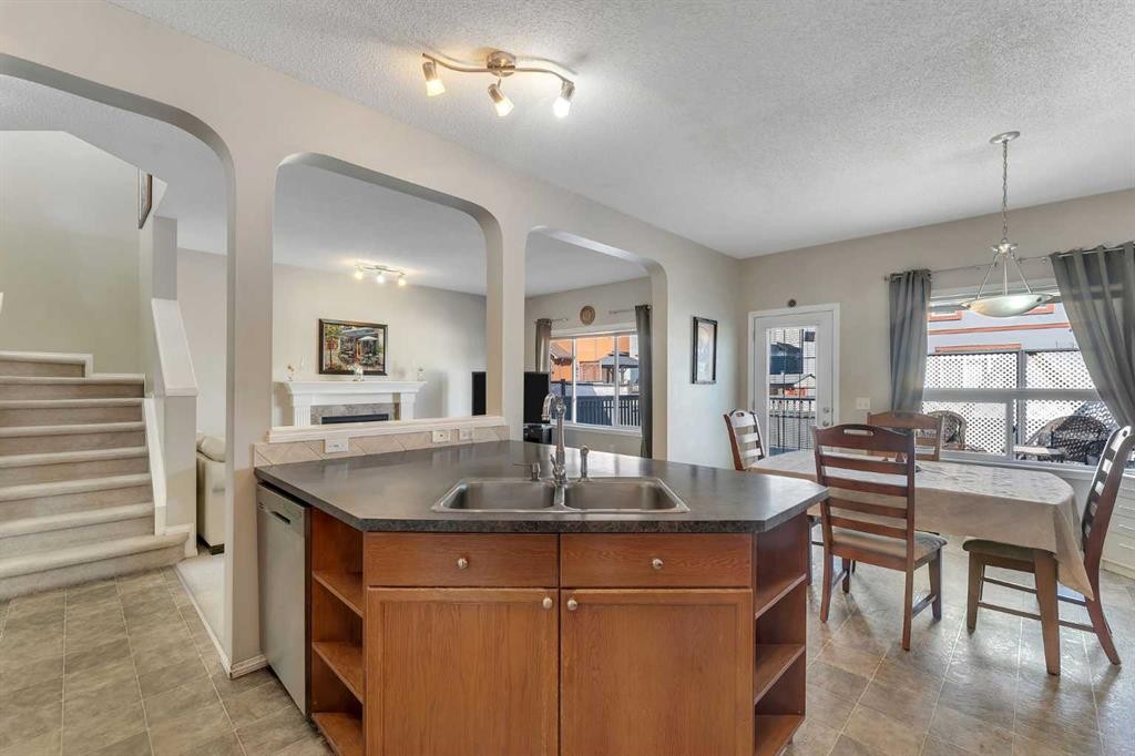 149 Saddlecrest Green Ne, Calgary, AB - Indoor Photo Showing Kitchen With Double Sink