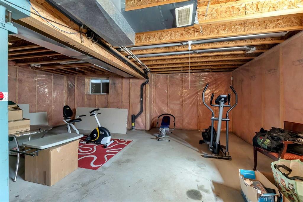 149 Saddlecrest Green Ne, Calgary, AB - Indoor Photo Showing Basement