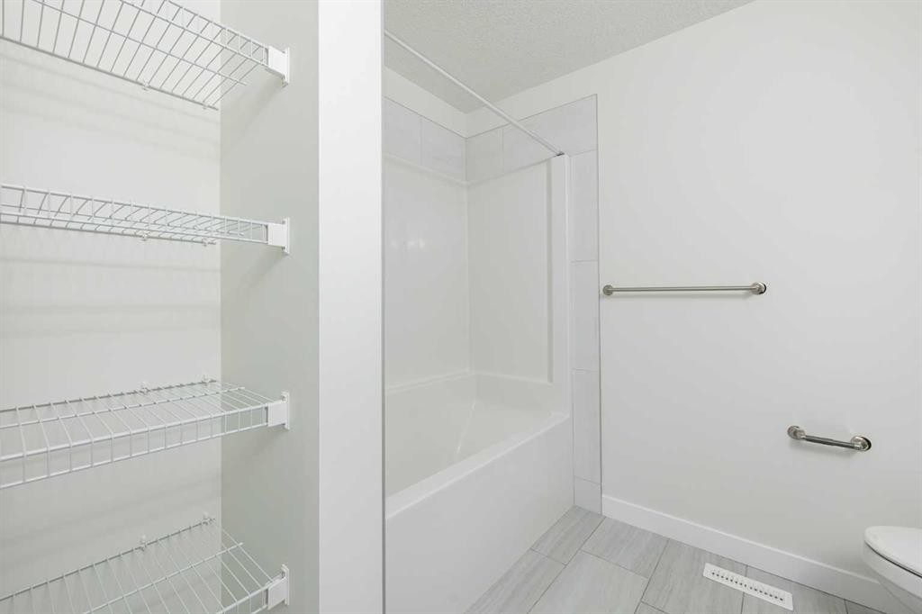 182 Sora Way Se, Calgary, AB - Indoor Photo Showing Bathroom