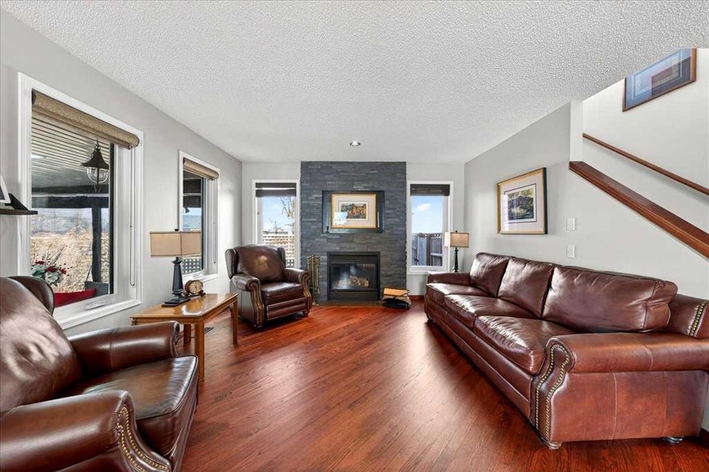 18 Inverness Rise Se, Calgary, AB - Indoor Photo Showing Living Room With Fireplace