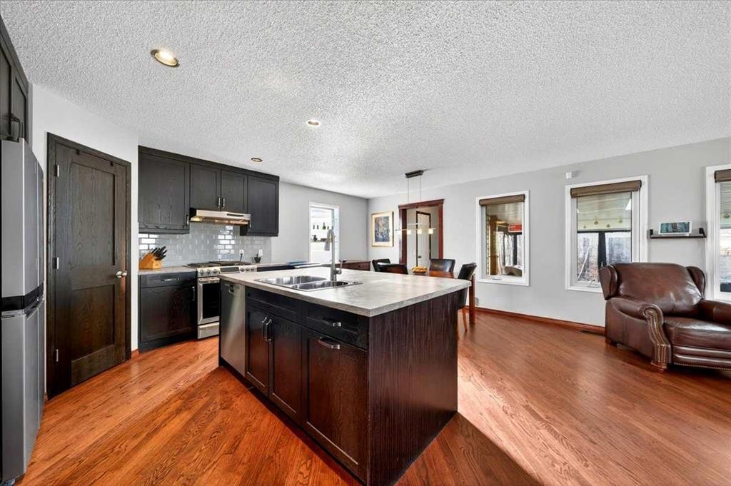 18 Inverness Rise Se, Calgary, AB - Indoor Photo Showing Kitchen With Stainless Steel Kitchen With Double Sink