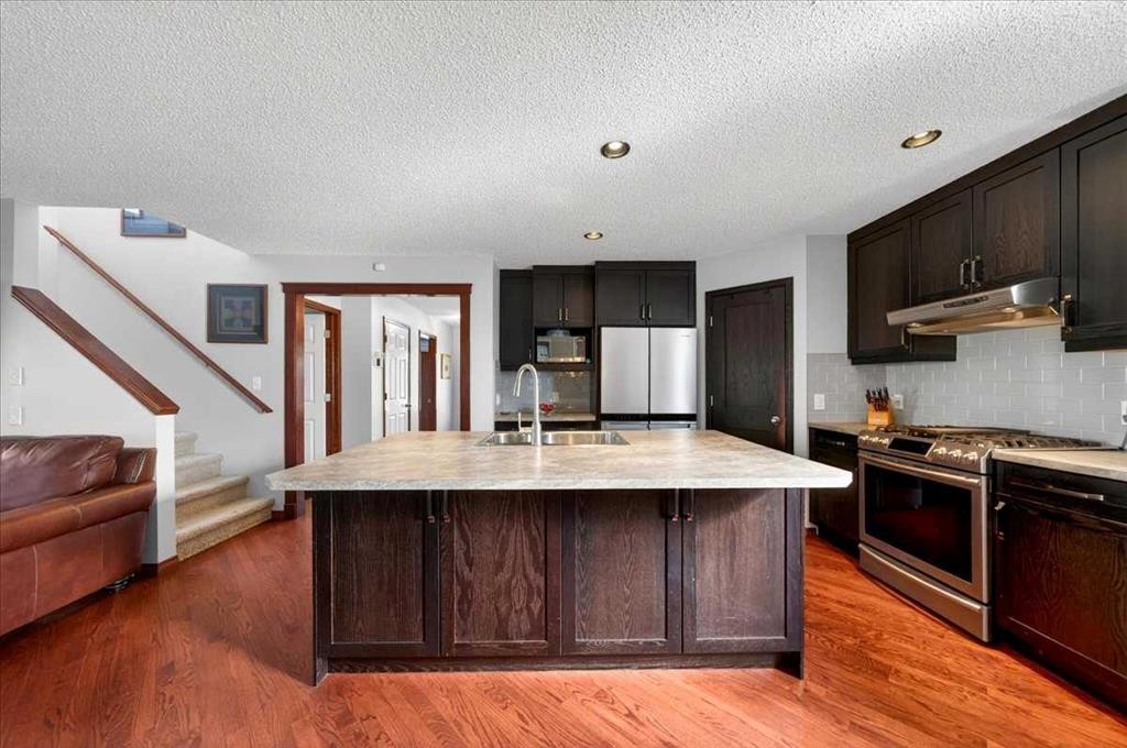 18 Inverness Rise Se, Calgary, AB - Indoor Photo Showing Kitchen With Double Sink