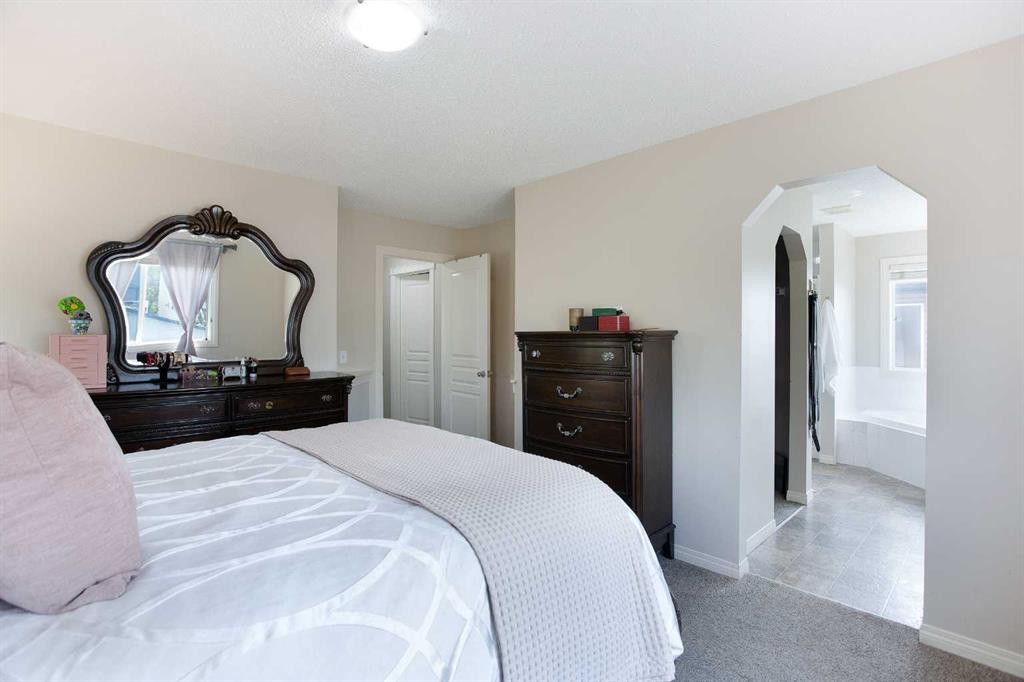 403 Morningside Way Sw, Airdrie, AB - Indoor Photo Showing Bedroom