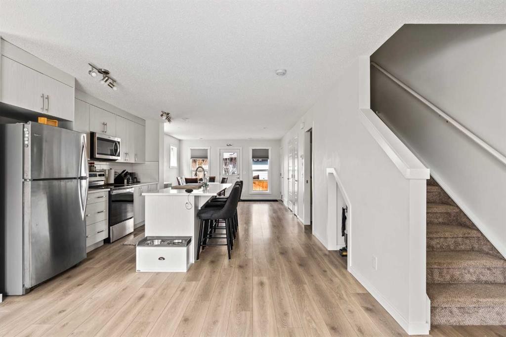 463 Cranbrook Square Se, Calgary, AB - Indoor Photo Showing Kitchen With Stainless Steel Kitchen