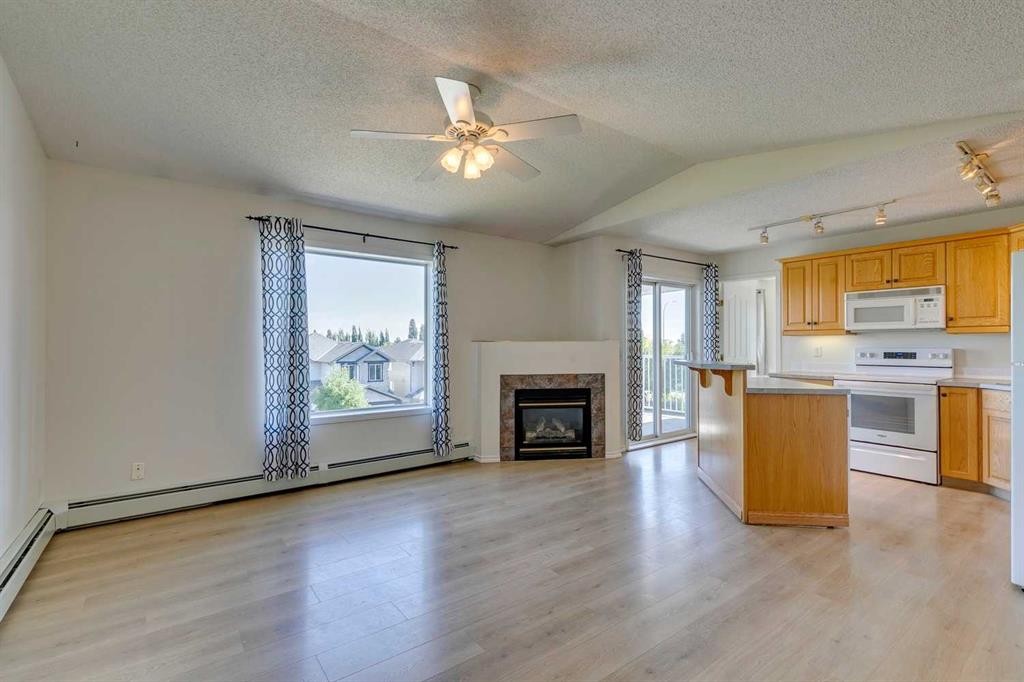 301-7301 Valleyview Park Se, Calgary, AB - Indoor With Fireplace