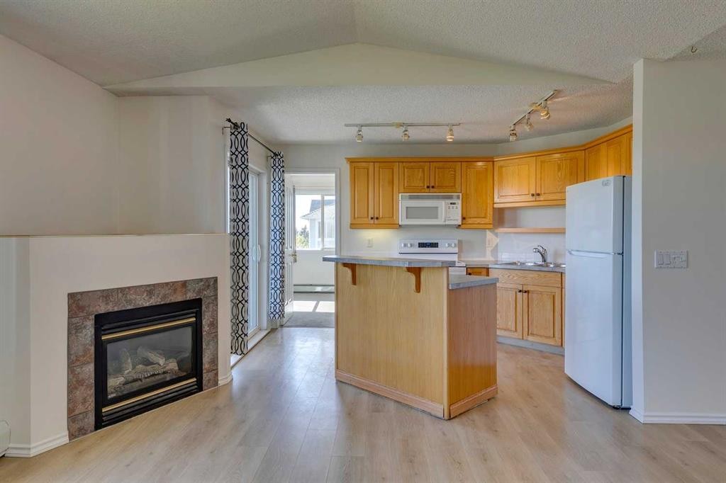 301-7301 Valleyview Park Se, Calgary, AB - Indoor With Fireplace