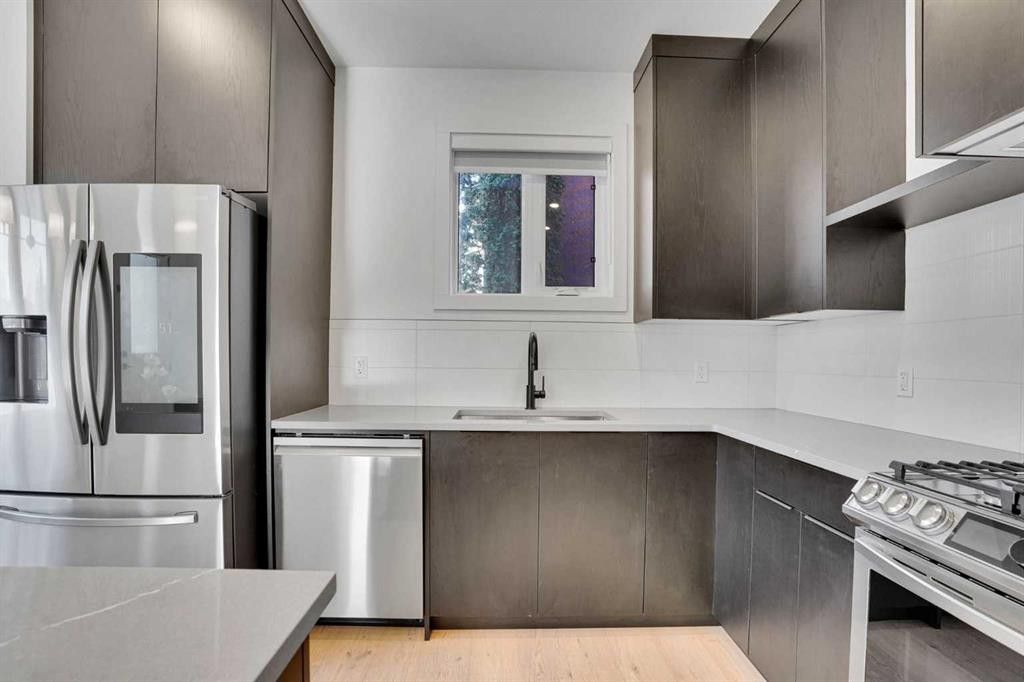 402 26 Avenue Nw, Calgary, AB - Indoor Photo Showing Kitchen With Stainless Steel Kitchen