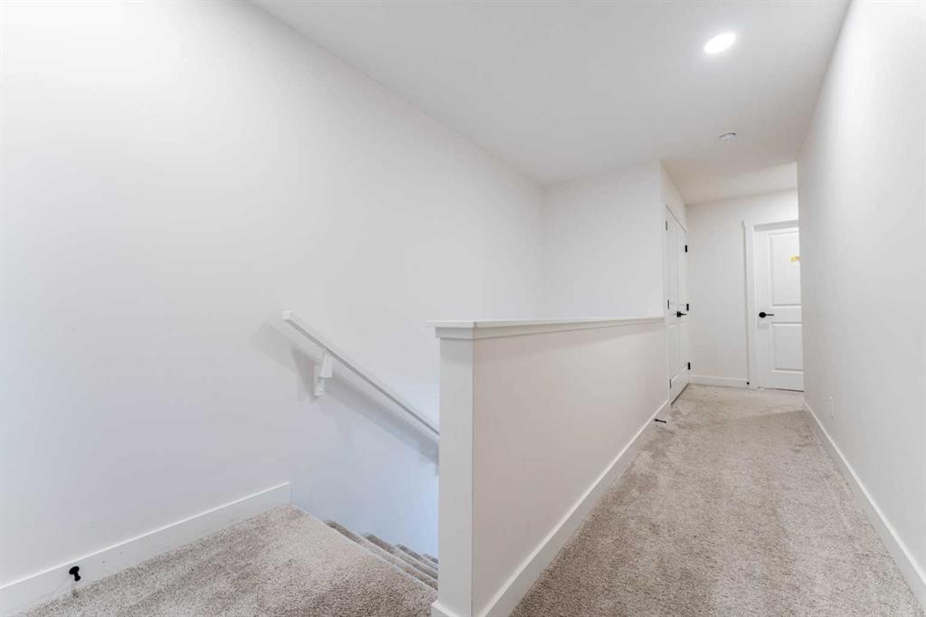 76 Lucas Boulevard Nw, Calgary, AB - Indoor Photo Showing Other Room