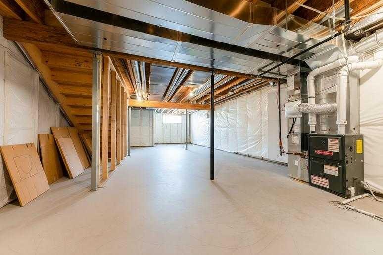 76 Lucas Boulevard Nw, Calgary, AB - Indoor Photo Showing Basement