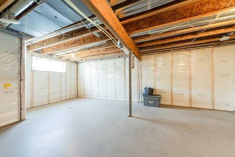 76 Lucas Boulevard Nw, Calgary, AB - Indoor Photo Showing Basement