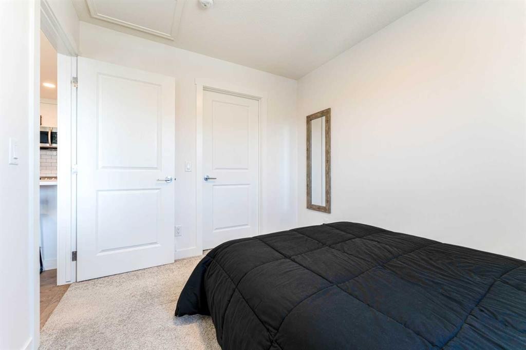 76 Lucas Boulevard Nw, Calgary, AB - Indoor Photo Showing Bedroom