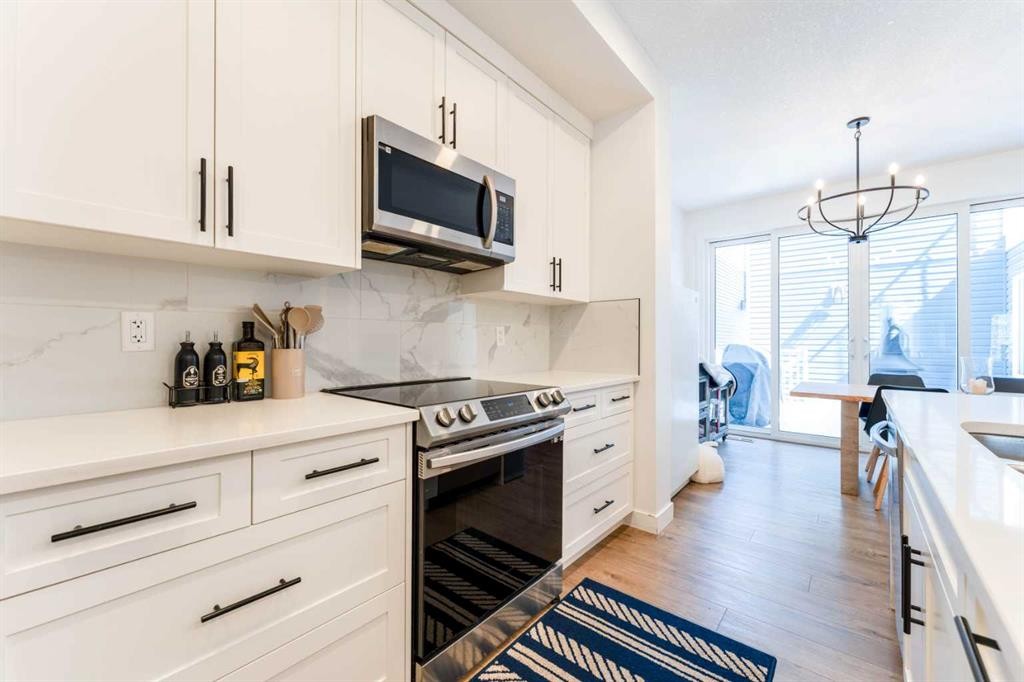 76 Lucas Boulevard Nw, Calgary, AB - Indoor Photo Showing Kitchen With Upgraded Kitchen