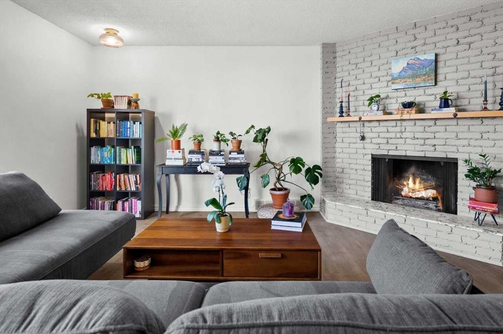 20 Brampton Crescent Sw, Calgary, AB - Indoor Photo Showing Living Room With Fireplace