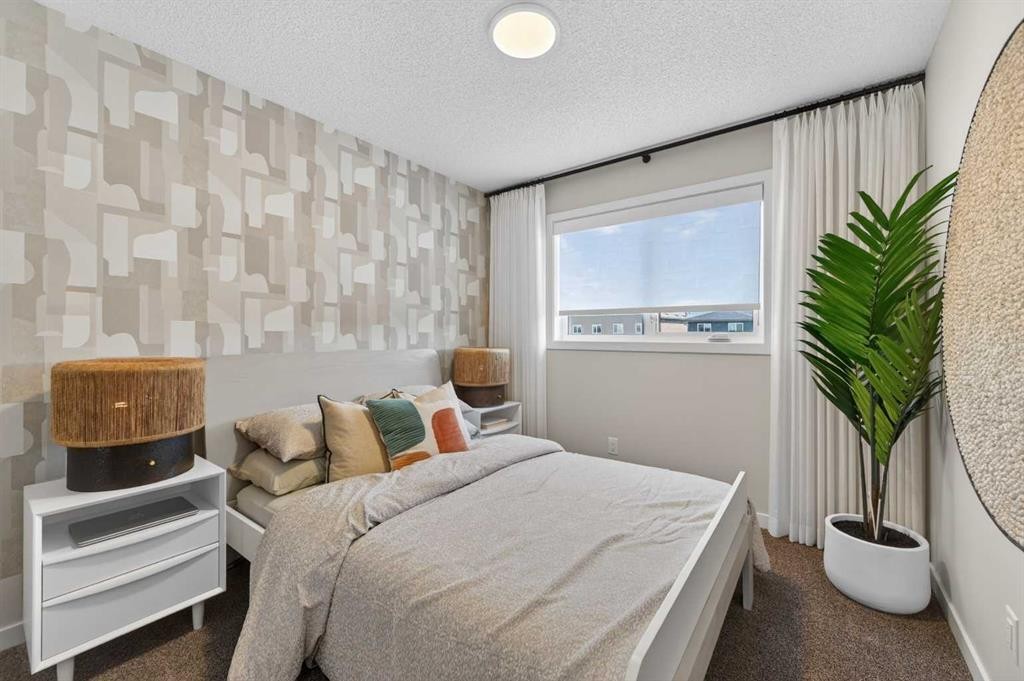 16 Belmont Place Sw, Calgary, AB - Indoor Photo Showing Bedroom