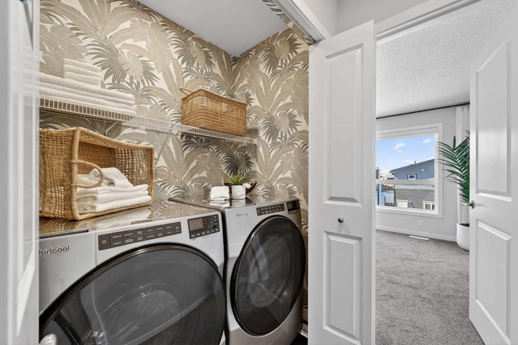 16 Belmont Place Sw, Calgary, AB - Indoor Photo Showing Laundry Room