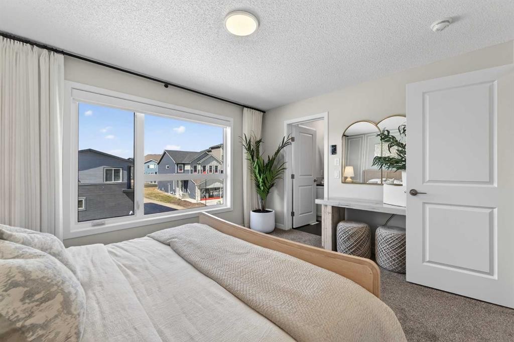 16 Belmont Place Sw, Calgary, AB - Indoor Photo Showing Bedroom