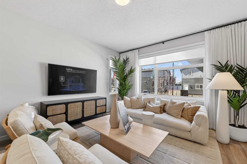 16 Belmont Place Sw, Calgary, AB - Indoor Photo Showing Living Room