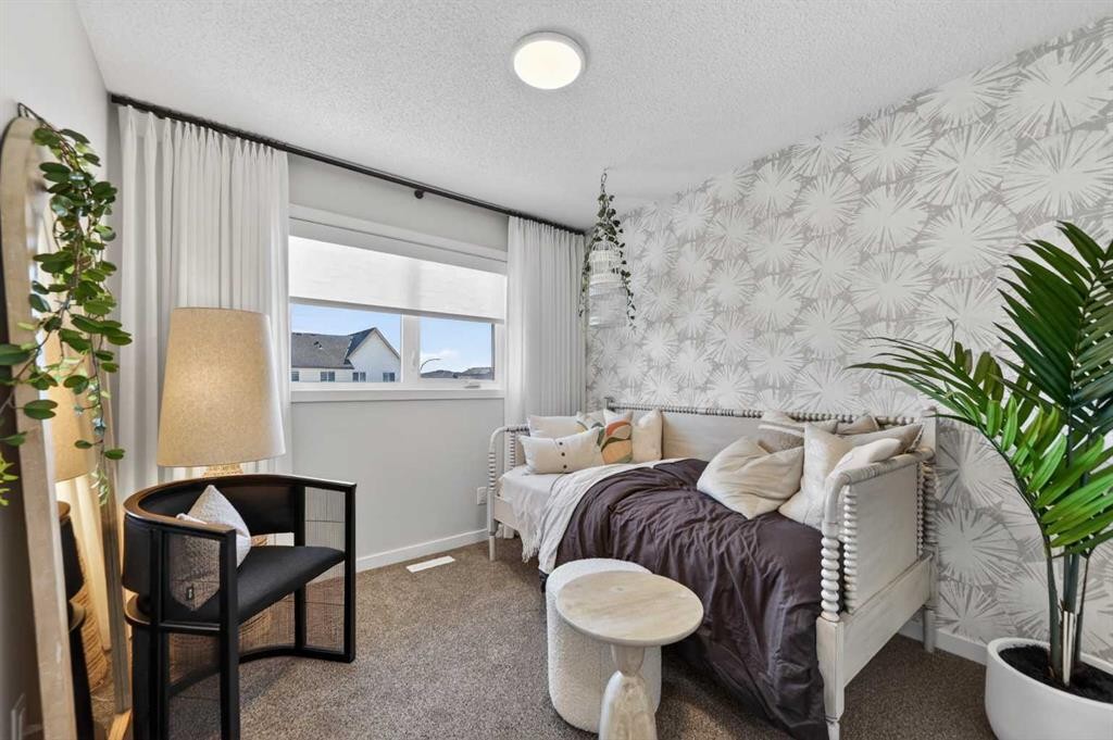 16 Belmont Place Sw, Calgary, AB - Indoor Photo Showing Bedroom