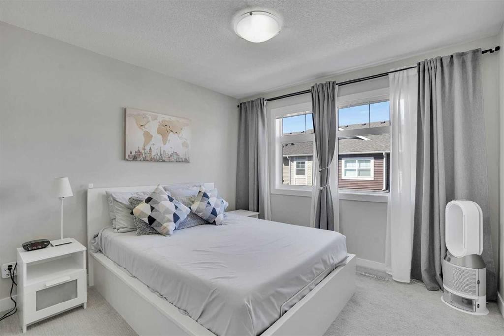104 Legacy Path Se, Calgary, AB - Indoor Photo Showing Bedroom