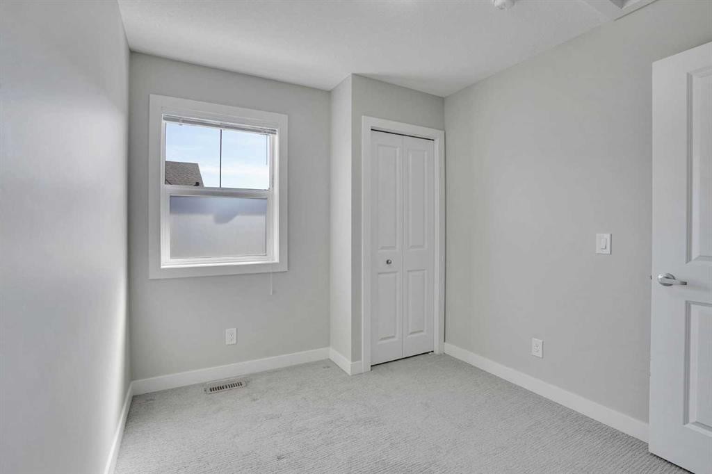 104 Legacy Path Se, Calgary, AB - Indoor Photo Showing Other Room