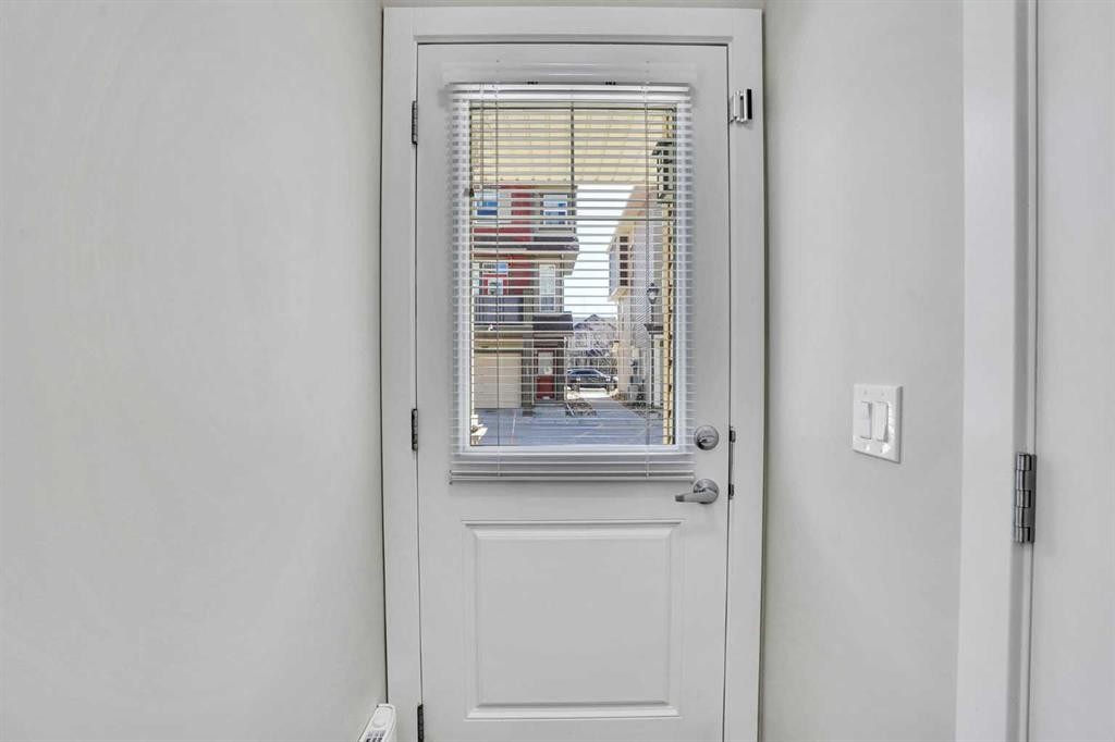 104 Legacy Path Se, Calgary, AB - Indoor Photo Showing Other Room