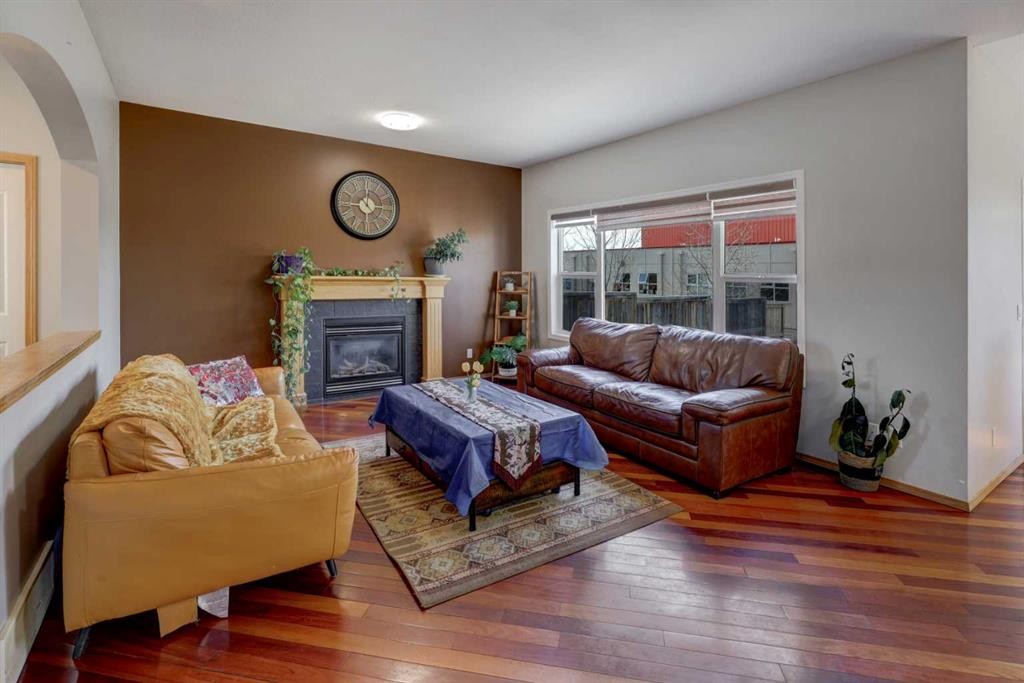 17 Royal Birch Way Nw, Calgary, AB - Indoor Photo Showing Living Room With Fireplace