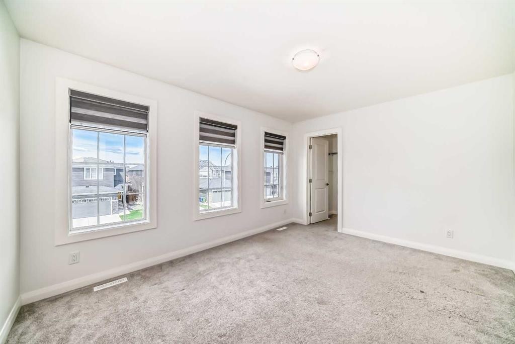 84 Evansfield Close Nw, Calgary, AB - Indoor Photo Showing Other Room
