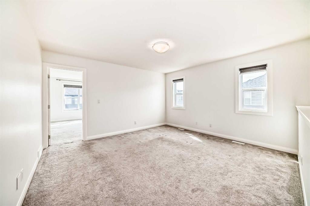 84 Evansfield Close Nw, Calgary, AB - Indoor Photo Showing Other Room