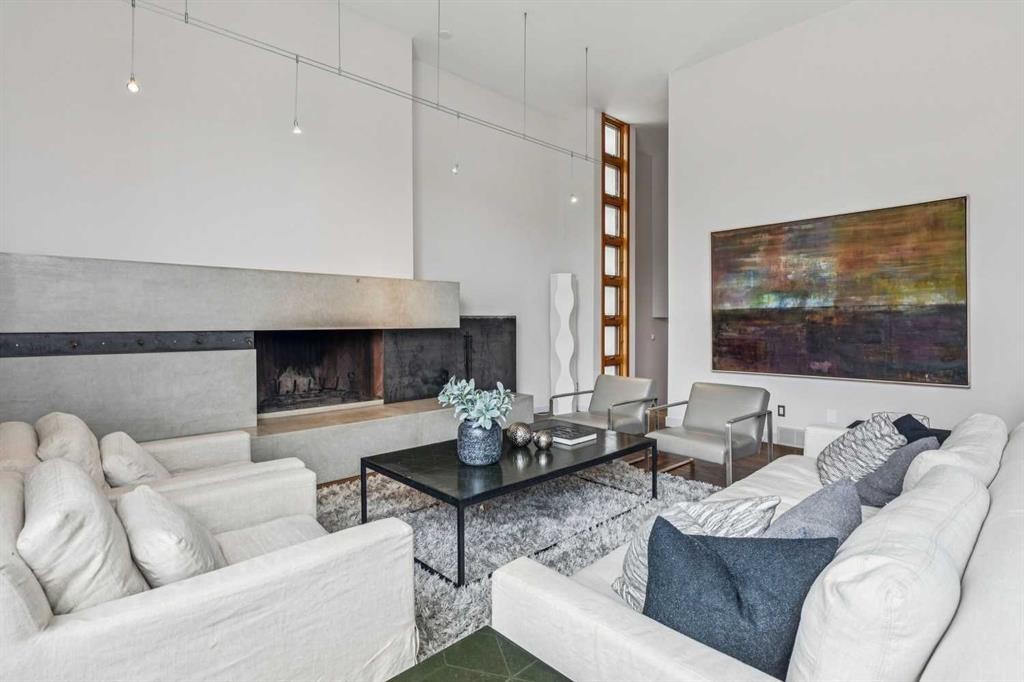 3905 Edison Crescent Sw, Calgary, AB - Indoor Photo Showing Living Room With Fireplace