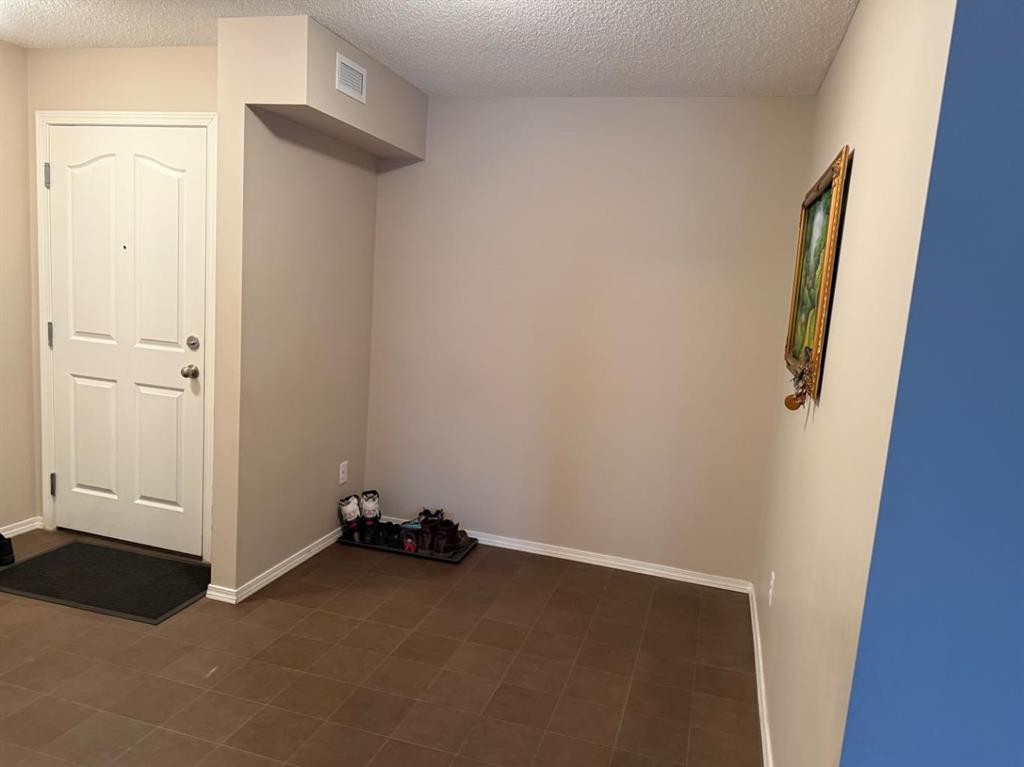 202-7210 80 Avenue Ne, Calgary, AB - Indoor Photo Showing Other Room