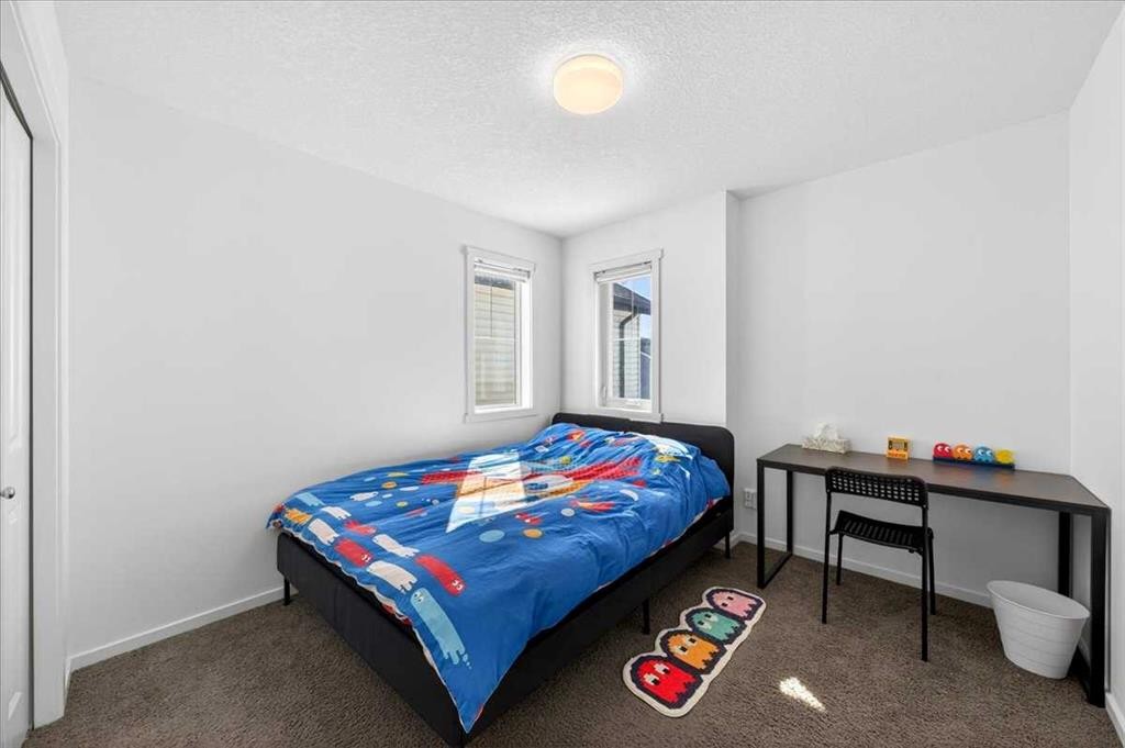 20 Nolancrest Green Nw, Calgary, AB - Indoor Photo Showing Bedroom